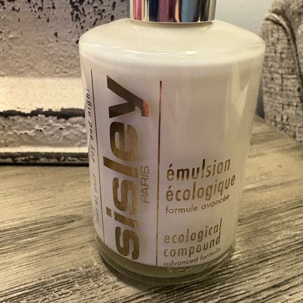 Sisley Cream Bottle with Silver Cap